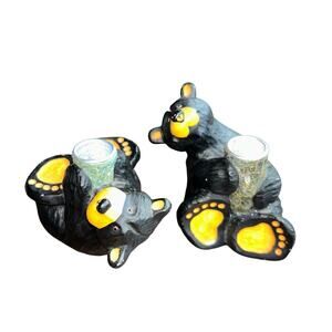 Miles & Constance Bearfoots candle holders Jeff Fleming Big Sky Carvers black